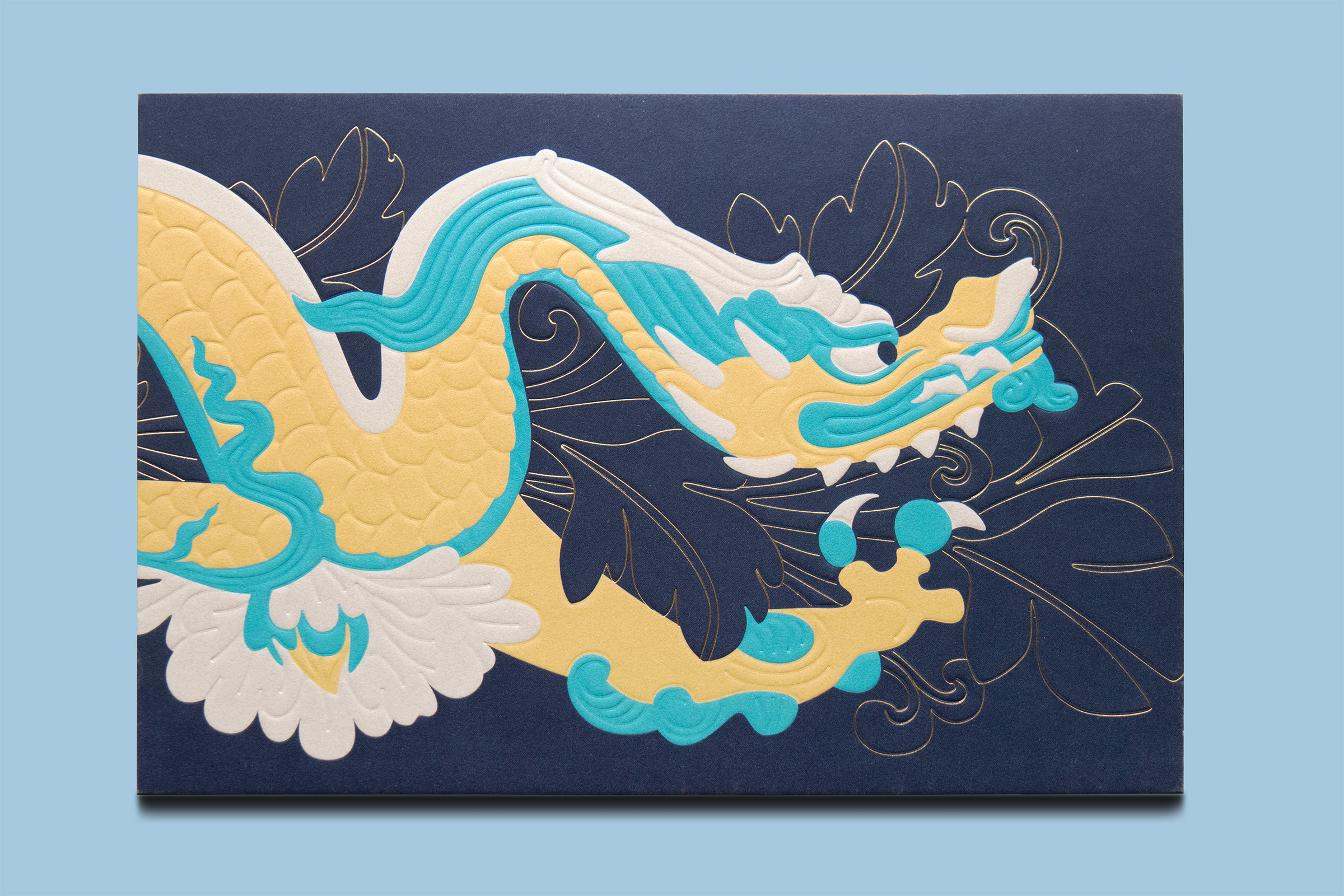 Top-down photo of the front of the invitation card